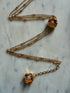SCULPTURAL FLOWER CHOKER