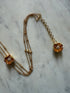 SCULPTURAL FLOWER CHOKER